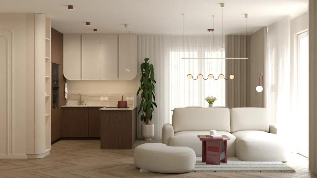 Salon z aneksem kuchennym, jasnym narożnikiem, bordowym stolikiem kawowym, ciemnym drewnem i eleganckim oświetleniem.