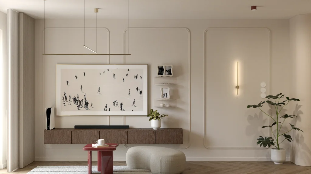 Ściana TV w salonie z telewizorem Samsung Frame, sztukaterią, wiszącą szafką z ciemnego drewna i bordowym stolikiem.